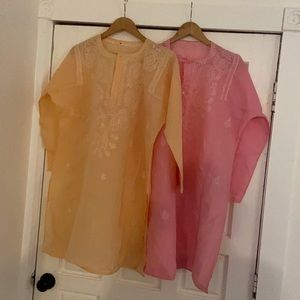2 beautiful tunic tops never worn